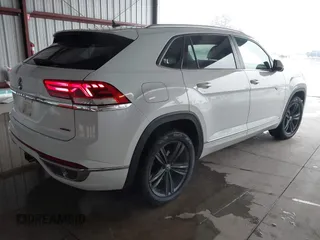 2021 Volkswagen Atlas SE z VIN 1V2NE2CA4MC201281, wystawiony jako IAAI lot #41242760 z przebiegiem 95 209 mil mil oraz . Historia ofert i sprzedaży dostępna na DreamBid. Obrazek 4.