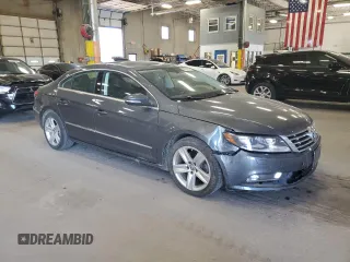 2014 Volkswagen CC R-Line с VIN WVWBP7AN0EE529627, выставлен на аукционе Copart как лот 56844195 с пробегом 158 048 миль миль и Списание • Salvage title. История ставок и продаж доступна на DreamBid. Изображение 4.