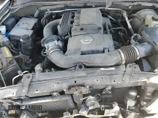 2005 Nissan Frontier LE z VIN 1N6AD06W45C406094, wystawiony jako Copart lot #54011914 z przebiegiem 165 293 mil mil oraz Szkoda całkowita • Salvage title. Historia ofert i sprzedaży dostępna na DreamBid. Obrazek 11.