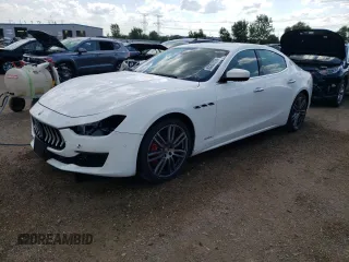 2019 Maserati Ghibli S Q4 GranLusso with VIN ZAM57YTL4K1312711, listed as a Copart auction lot 63291414 with 24,467 mi miles and Salvage Title. Bid and sale history available at carsss.com. Image 1.