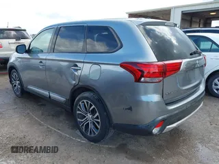 2016 Mitsubishi Outlander SE with VIN JA4AD3A32GZ018986, listed as a IAAI auction lot 42554985 with 177,402 mi miles and . Bid and sale history available at DreamBid. Image 3.