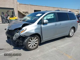2015 Toyota Sienna XLE with VIN 5TDYK3DC5FS594514, listed as a IAAI auction lot 42183673 with 120,978 mi miles and . Bid and sale history available at DreamBid. Image 2.