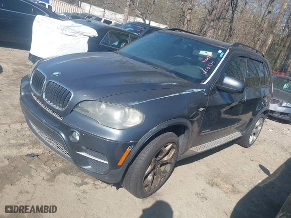2011 BMW X5 35i with VIN 5UXZV4C58BL410570, listed as a IAAI auction lot 41886238 with 164,192 mi miles. Bid and sale history available at carsss.com. Image 2.