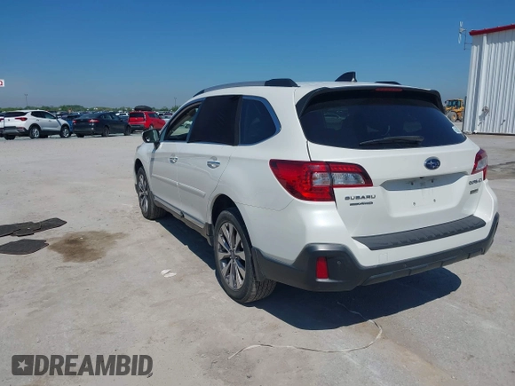 2018 Subaru Outback Touring with VIN 4S4BSATC5J3336205, listed as a IAAI auction lot 42201530 with 103,362 mi miles and . Bid and sale history available at DreamBid. Image 3.