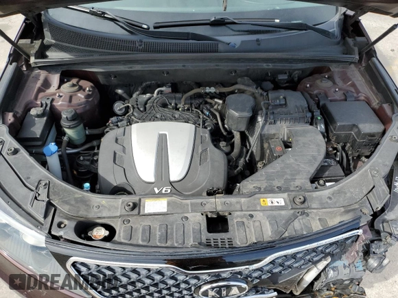 2013 Kia Sorento SX z VIN 5XYKWDA22DG389884, wystawiony jako Copart lot #58813735 z przebiegiem 101 567 mil mil oraz Szkoda całkowita • Salvage title. Historia ofert i sprzedaży dostępna na DreamBid. Obrazek 12.