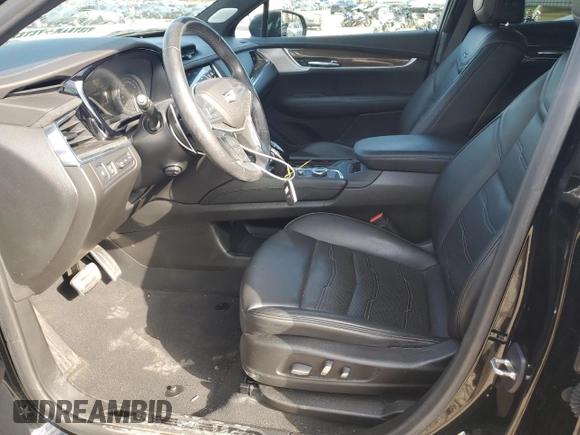 2021 Cadillac XT5 AWD Sport with VIN 1GYKNHRS3MZ103180, listed as a Copart auction lot 77166714 with 17,659 mi miles and Salvage title. Bid and sale history available at DreamBid. Image 7.