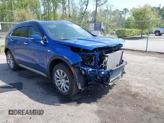 2023 Cadillac XT4 FWD Premium Luxury with VIN 1GYFZCR43PF104796, listed as a IAAI auction lot 41931695 with 12,666 mi miles. Bid and sale history available at carsss.com. Image 1.
