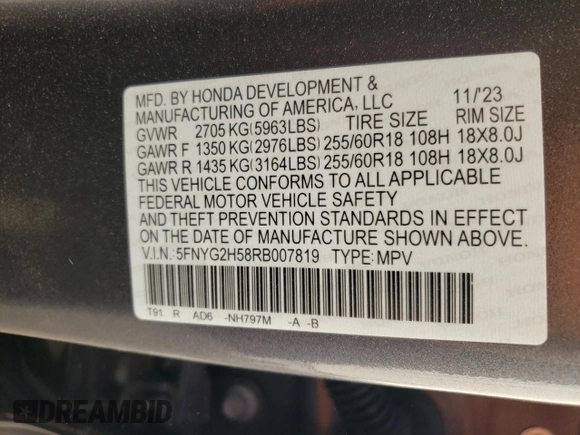 2024 Honda Pilot EX-L 7 Passenger with VIN 5FNYG2H58RB007819, listed as a Copart auction lot 77101344 with 2,829 mi miles and Salvage Title. Bid and sale history available at carsss.com. Image 12.