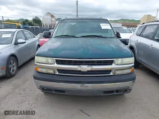 2003 Chevrolet Tahoe LS with VIN 1GNEC13V13J250718, listed as a IAAI auction lot 41981819 with 303,969 mi miles. Bid and sale history available at carsss.com. Image 6.