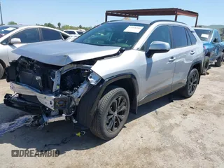 2022 Toyota RAV4 Hybrid SE with VIN JTM16RFV7ND062263, listed as a IAAI auction lot 42068485 with 25,282 mi miles and . Bid and sale history available at DreamBid. Image 2.