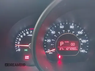 2014 Kia Soul + with VIN KNDJP3A55E7097836, listed as a IAAI auction lot 41276910 with 127,280 mi miles and . Bid and sale history available at DreamBid. Image 7.