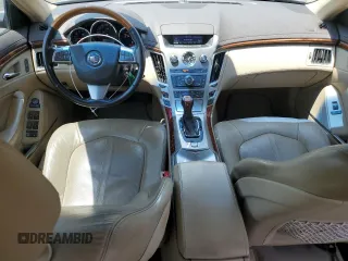 2012 Cadillac CTS Luxury with VIN 1G6DE5E54C0138040, listed as a Copart auction lot 61997305 with 140,996 mi miles and Salvage title. Bid and sale history available at DreamBid. Image 8.