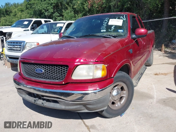 2002 Ford F-150 XL with VIN 1FTRX17W02KB40270, listed as a IAAI auction lot 42573017 with Not provided miles and . Bid and sale history available at DreamBid. Image 2.