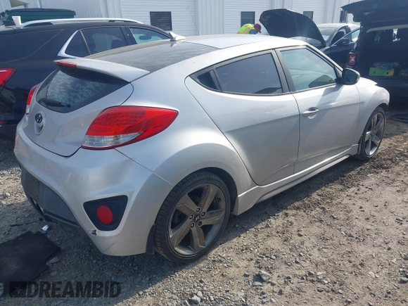 2013 Hyundai Veloster Turbo with VIN KMHTC6AE4DU157798, listed as a IAAI auction lot 42001561 with 163,370 mi miles and . Bid and sale history available at DreamBid. Image 4.