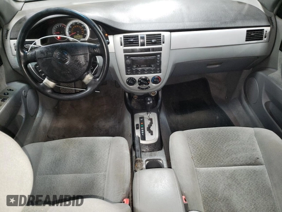 2004 Suzuki Forenza S z VIN KL5JD52Z14K975804, wystawiony jako Copart lot #43227455 z przebiegiem 114 726 mil mil oraz Szkody całkowita. Historia ofert i sprzedaży dostępna na DreamBid. Obrazek 8.
