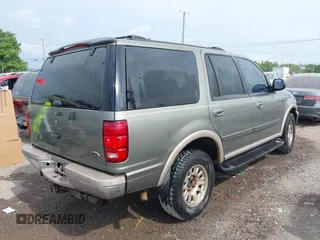 1999 Ford Expedition XLT with VIN 1FMPU18L2XLB53295, listed as a IAAI auction lot 42436012 with Not provided miles and . Bid and sale history available at DreamBid. Image 4.