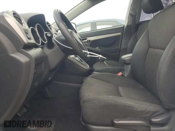 2009 Pontiac Vibe 1SB with VIN 5Y2SP67019Z433171, listed as a Copart auction lot 50663575 with 145,056 mi miles and Salvage Title. Bid and sale history available at DreamBid. Image 7.