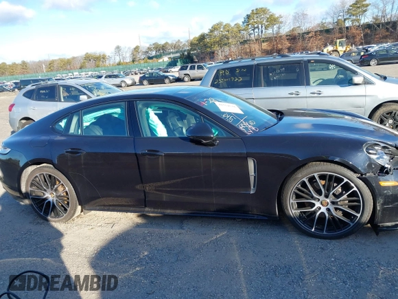 2023 Porsche Panamera with VIN WP0AJ2A77PL100226, listed as a IAAI auction lot 41554538 with 52,257 mi miles and . Bid and sale history available at DreamBid. Image 13.