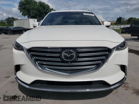 2021 Mazda CX-9 Grand Touring with VIN JM3TCADY7M0501717, listed as a Copart auction lot 59402875 with 53,218 mi miles and Salvage title. Bid and sale history available at DreamBid. Image 5.