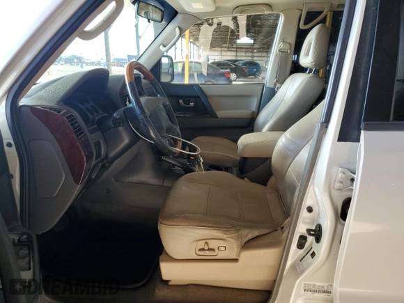 2006 Mitsubishi Montero Limited z VIN JA4MW51SX6J003398, wystawiony jako Copart lot #70511684 z przebiegiem 167 981 mil mil oraz Tytuł czysty. Historia ofert i sprzedaży dostępna na DreamBid. Obrazek 7.