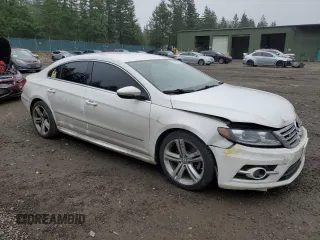 2014 Volkswagen CC Sport with VIN WVWBP7ANXEE512561, listed as a Copart auction lot 88355865 with 140,981 mi miles and Salvage Title. Bid and sale history available at carsss.com. Image 4.