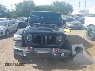 2024 Jeep Wrangler Rubicon with VIN 1C4PJXFG0RW271322, listed as a IAAI auction lot 42736647 with 32,319 mi miles and . Bid and sale history available at DreamBid. Image 12.