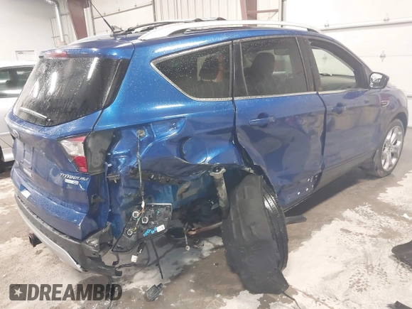 2018 Ford Escape Titanium with VIN 1FMCU9J99JUB94925, listed as a IAAI auction lot 42412800 with 95,880 mi miles and . Bid and sale history available at DreamBid. Image 4.