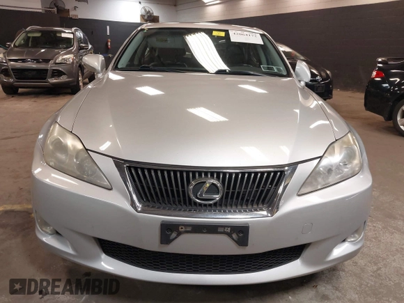 2009 Lexus IS 250 z VIN JTHCK262395033360, wystawiony jako IAAI lot #42064172 z przebiegiem 133 542 mil mil oraz . Historia ofert i sprzedaży dostępna na DreamBid. Obrazek 12.