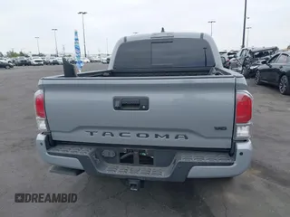 2021 Toyota Tacoma SR with VIN 3TMCZ5AN2MM405869, listed as a IAAI auction lot 42094533 with 78,449 mi miles and . Bid and sale history available at DreamBid. Image 17.
