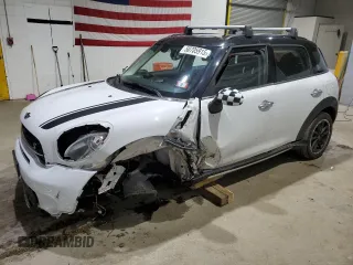 2016 MINI Countryman S with VIN WMWZC5C54GWT39755, listed as a Copart auction lot 50705915 with 133,466 mi miles and Salvage Title. Bid and sale history available at DreamBid. Image 1.