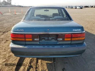 1992 Mazda 626 z VIN 1YVGD22B5N5212605, wystawiony jako Copart lot #74945704 z przebiegiem 99 659 mil mil oraz Tytuł czysty. Historia ofert i sprzedaży dostępna na DreamBid. Obrazek 6.