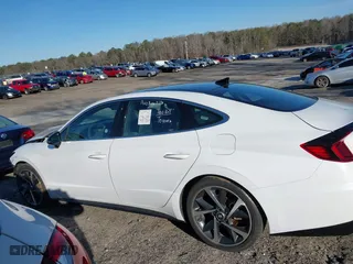 2023 Hyundai Sonata SEL Plus with VIN KMHL44J27PA275714, listed as a IAAI auction lot 41590344 with 64,951 mi miles. Bid and sale history available at carsss.com. Image 14.