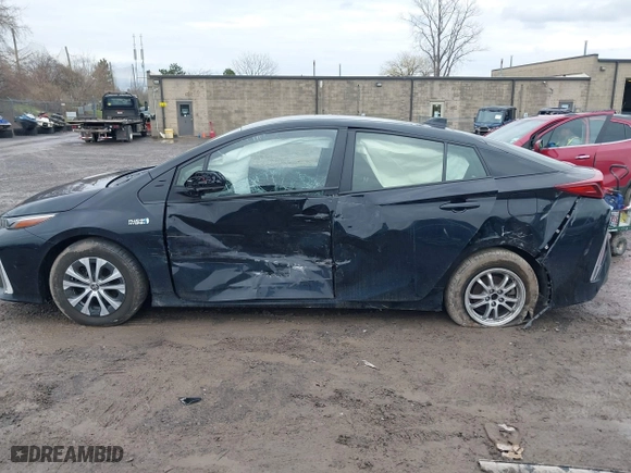 2021 Toyota Prius Prime LE with VIN JTDKAMFP2M3165859, listed as a IAAI auction lot 41943098 with 20,306 mi miles. Bid and sale history available at carsss.com. Image 15.