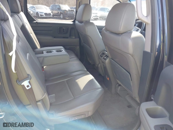 2011 Honda Ridgeline RTL with VIN 5FPYK1F51BB011686, listed as a IAAI auction lot 41790303 with 110,648 mi miles. Bid and sale history available at carsss.com. Image 8.