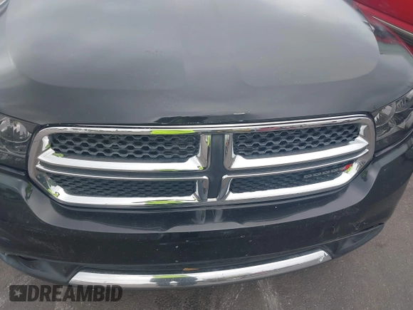 2012 Dodge Durango SXT with VIN 1C4RDJAG4CC314444, listed as a IAAI auction lot 42535630 with 205,494 mi miles and . Bid and sale history available at DreamBid. Image 6.