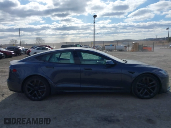 2021 Tesla Model S Plaid with VIN 5YJSA1E60MF455768, listed as a IAAI auction lot 41603504 with 27,398 mi miles. Bid and sale history available at carsss.com. Image 13.
