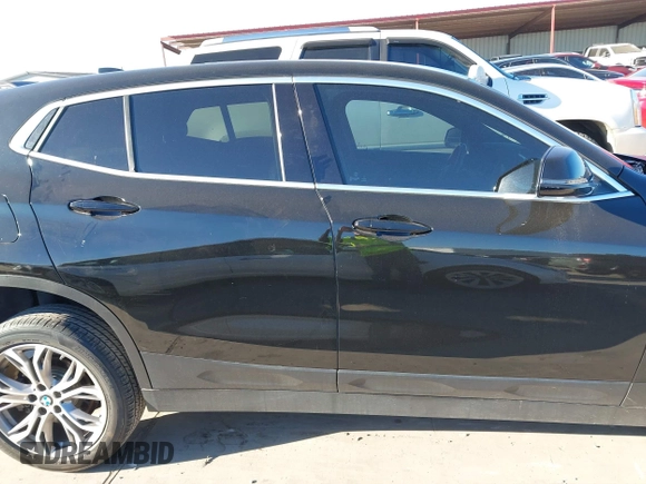 2019 BMW X2 sDrive28i with VIN WBXYJ3C50KEP77327, listed as a IAAI auction lot 40922194 with 94,672 mi miles. Bid and sale history available at carsss.com. Image 14.