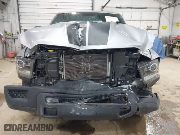 2021 Ram 1500 Warlock with VIN 1C6RR7GT0MS510761, listed as a IAAI auction lot 42212531 with 34,295 mi miles and . Bid and sale history available at DreamBid. Image 12.