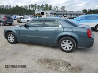2005 Chrysler 300 with VIN 2C3JA53G95H616536, listed as a Copart auction lot 51099885 with 186,749 mi miles and Salvage Title. Bid and sale history available at carsss.com. Image 2.