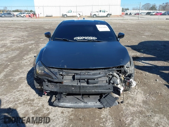 2014 Scion FR-S z VIN JF1ZNAA14E9708590, wystawiony jako IAAI lot #41278089 z przebiegiem 117 357 mil mil oraz . Historia ofert i sprzedaży dostępna na DreamBid. Obrazek 13.