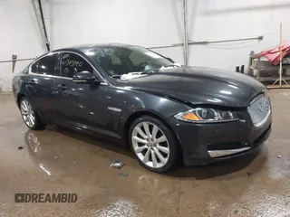 2013 Jaguar XF V6 SC with VIN SAJWJ0EF3D8S90652, listed as a IAAI auction lot 41595726 with 110,880 mi miles. Bid and sale history available at carsss.com. Image 1.