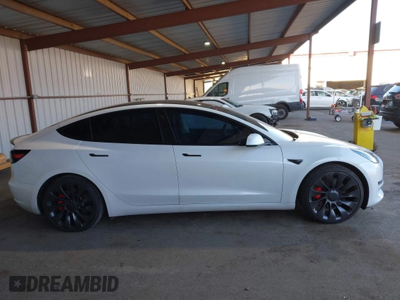 2021 Tesla Model 3 Performance with VIN 5YJ3E1EC4MF097993, listed as a IAAI auction lot 41366615 with 30,735 mi miles and . Bid and sale history available at DreamBid. Image 13.