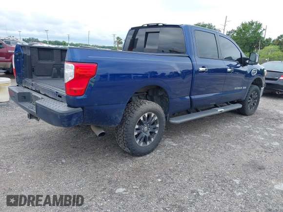 2019 Nissan Titan XD SV with VIN 1N6BA1F46KN514637, listed as a IAAI auction lot 41986617 with 123,872 mi miles. Bid and sale history available at carsss.com. Image 4.