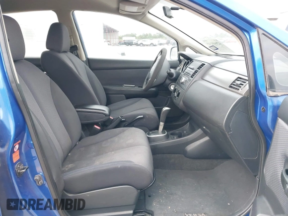 2009 Nissan Versa 1.8 SL with VIN 3N1BC13E89L350489, listed as a IAAI auction lot 42048145 with 166,079 mi miles. Bid and sale history available at carsss.com. Image 5.