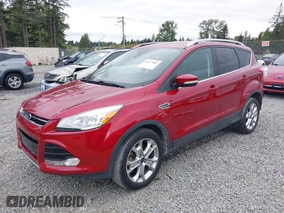 2014 Ford Escape Titanium with VIN 1FMCU9J9XEUD71715, listed as a IAAI auction lot 42127982 with 96,549 mi miles and . Bid and sale history available at DreamBid. Image 17.