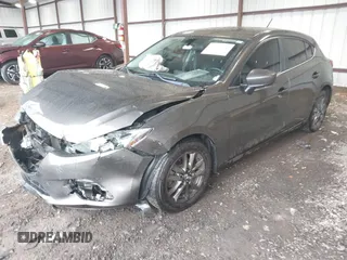 2014 Mazda 3 i Touring with VIN 3MZBM1L75EM109082, listed as a IAAI auction lot 41625740 with 123,618 mi miles. Bid and sale history available at carsss.com. Image 2.