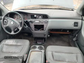 2004 Honda Odyssey EX-L z VIN 5FNRL18924B040028, wystawiony jako Copart lot #55338715 z przebiegiem 242 055 mil mil oraz Szkoda całkowita • Salvage title. Historia ofert i sprzedaży dostępna na DreamBid. Obrazek 8.