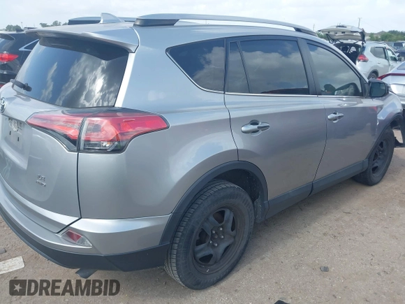 2018 Toyota RAV4 LE with VIN 2T3BFREV8JW758553, listed as a IAAI auction lot 42539300 with 116,337 mi miles and . Bid and sale history available at DreamBid. Image 4.