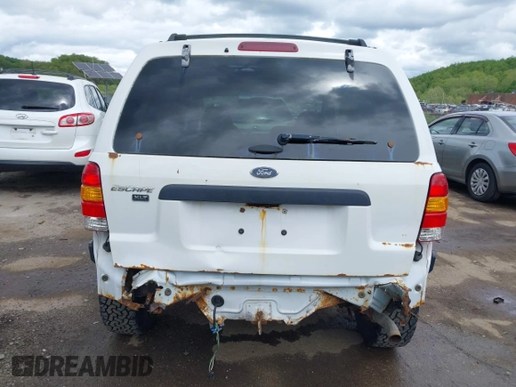 2003 Ford Escape XLT Popular 2 with VIN 1FMYU93193KC06499, listed as a IAAI auction lot 42192640 with 180,095 mi miles and . Bid and sale history available at DreamBid. Image 6.