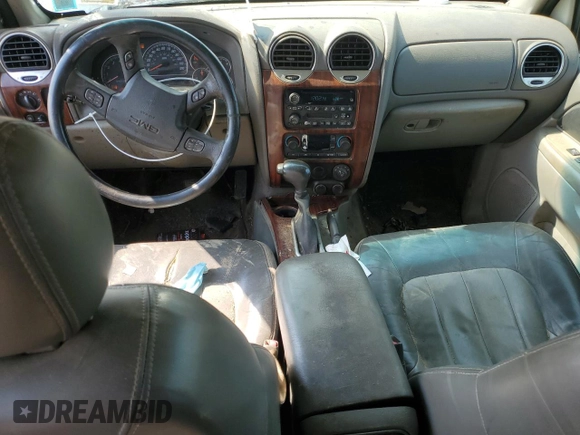2004 GMC Envoy SLT with VIN 1GKDT13S342188670, listed as a Copart auction lot 59080825 with 334,233 mi miles and Salvage title. Bid and sale history available at DreamBid. Image 8.